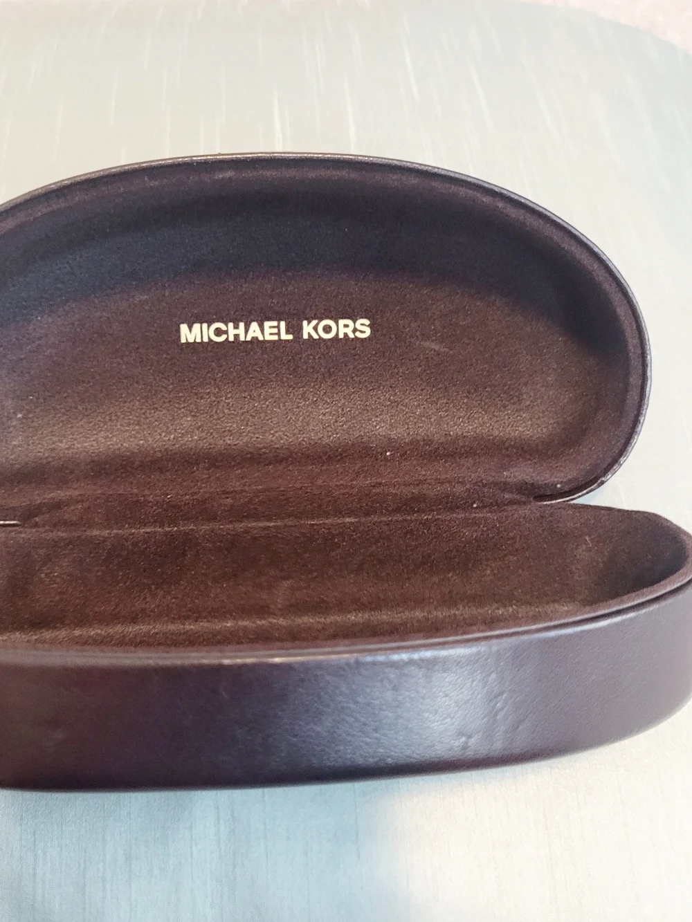 Michael Kors very gently